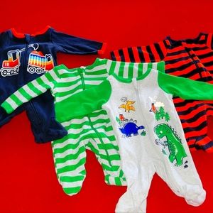 4 newborn winter onesies- never worn